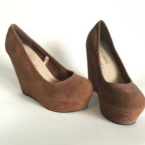 Brown Faux Suede wedge heel, very comfortable.